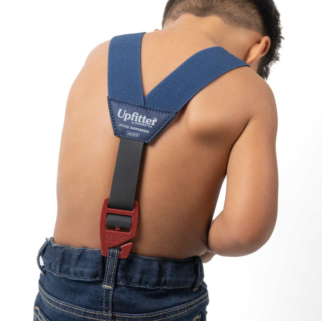 Rear strap adjusts on the hook to grow with your child.